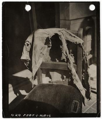 [Charred boy's jacket found near Hiroshima City Hall], November 5, 1945.